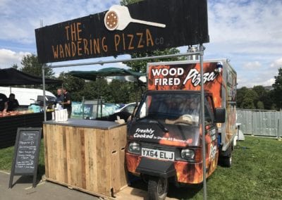 Piaggio Truck set up to serve pizza at an event